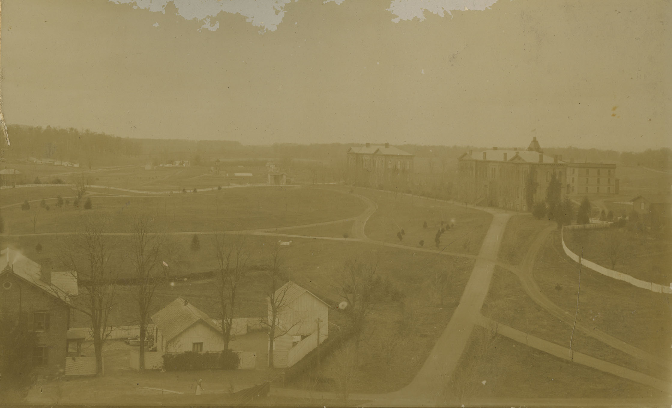 distant view of Virginia Tech president's house in sepia tones