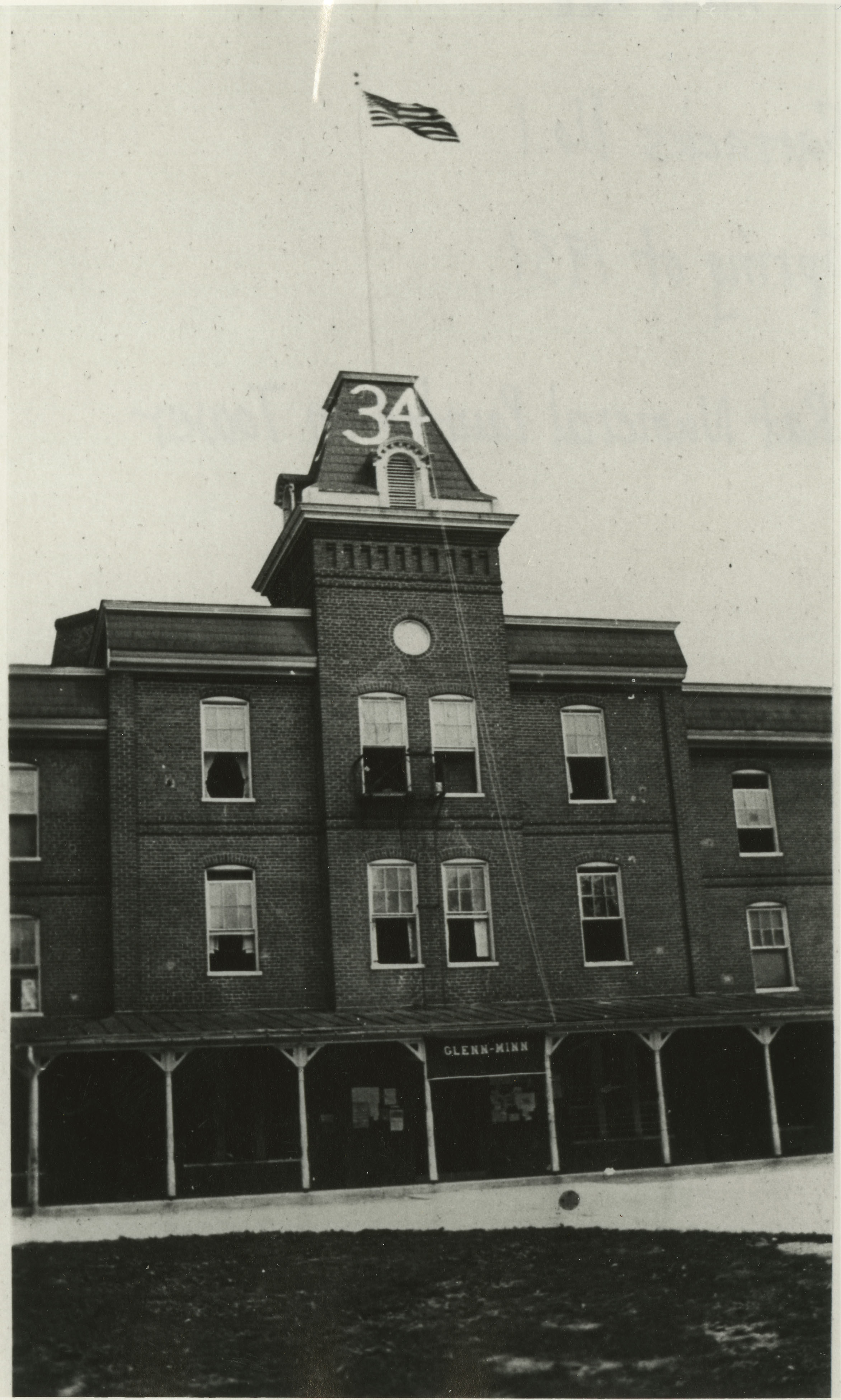 Barracks No. 1 (now Lane Hall), Spring 1931, "Rat Numeral Painted on Tower." Apparently, a freshman cadet was being called out!