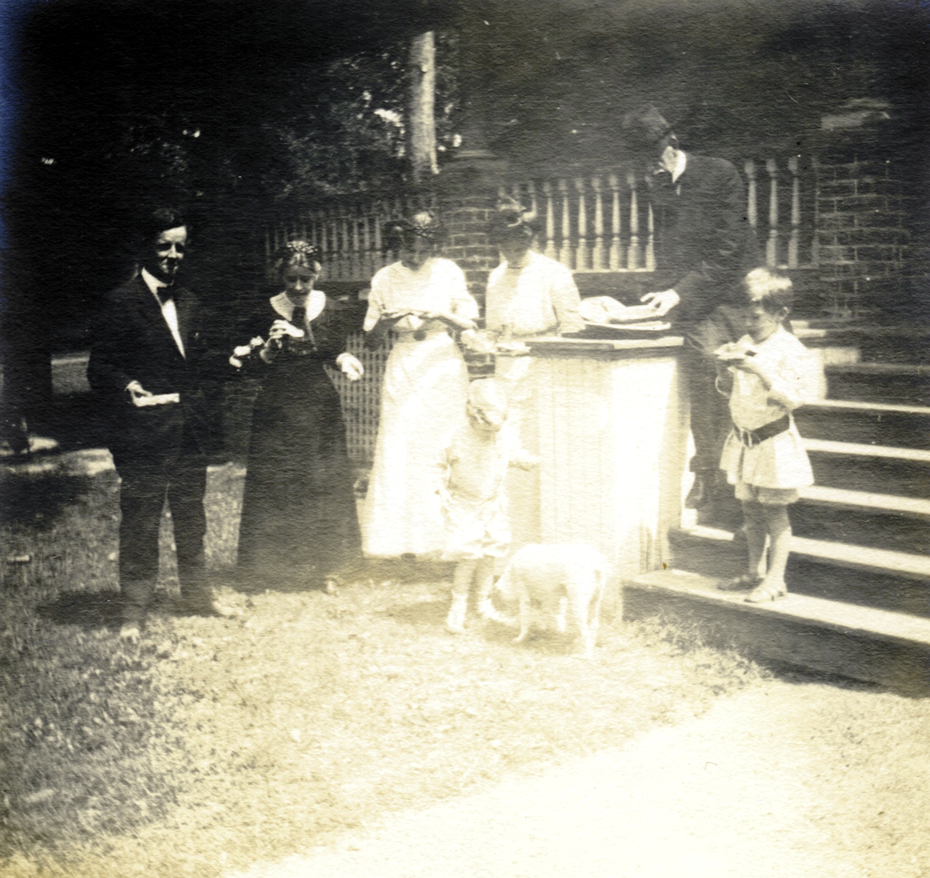 Cora Bolton McBryde (second from left), President McBryde (second from the right), and family enjoy a snack