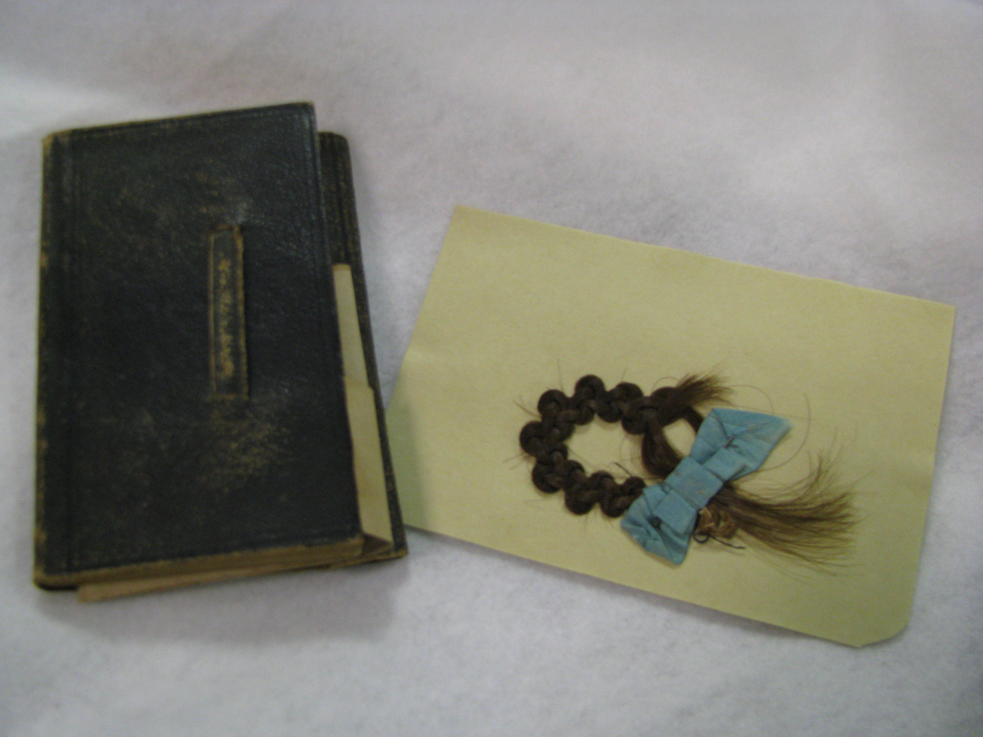 The intricate braid of this lock of hair found in the back pocket of a diary in the John D. Wagg Papers (Ms1992-048) suggests that it may have been intended for ornamental use. 