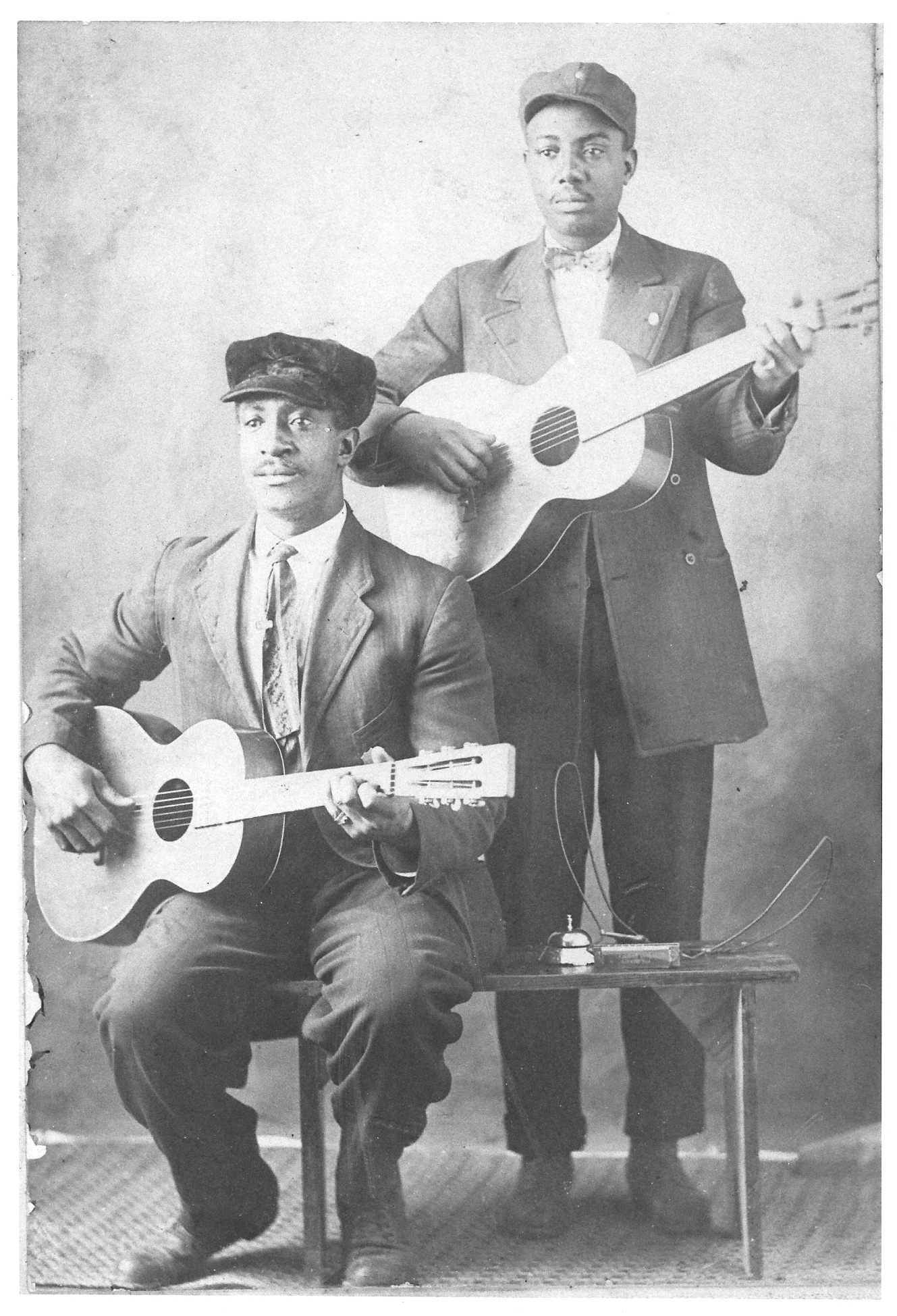 Floyd Meade (seated) and unidentified man (possibly nephew Emmett Meade, Jr.)