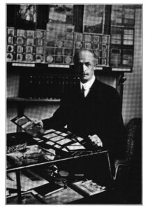 Romeyn Beck Hough with his samples, from California's Magazine (1916), Hough's "American Woods," vol. 2, p. 285.