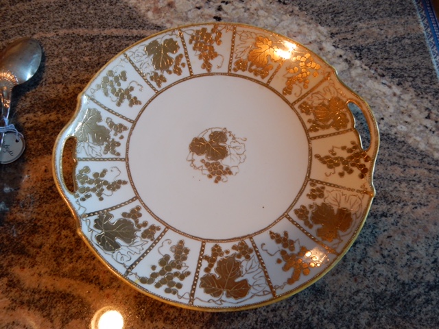 cookie plate with handles and decorated with gold grapes and grape leaves