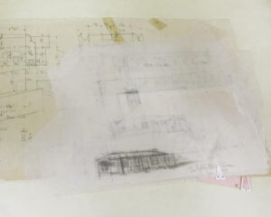 Architectural drawings and sketches in a folder